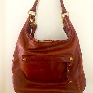 Frye brown cognac leather bag.